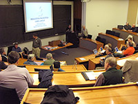 Members are getting ready for the main meeting in Bowl 1 of Robertson Hall
