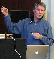 Bill Achuff, freelance photojournalist and photographer (photo from the November 10, 2009 meeting.)